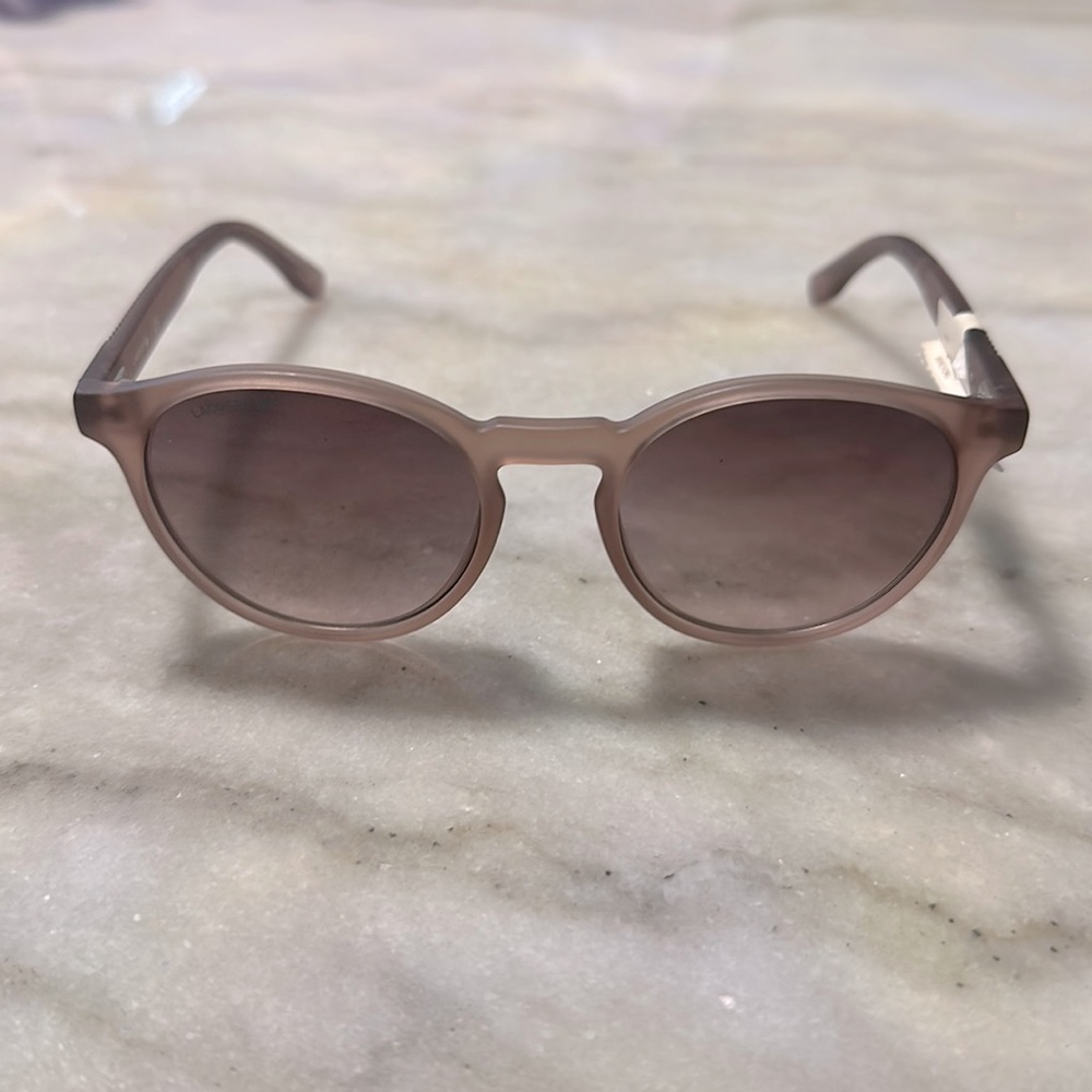 Unisex transparent nude Lacoste sunglasses